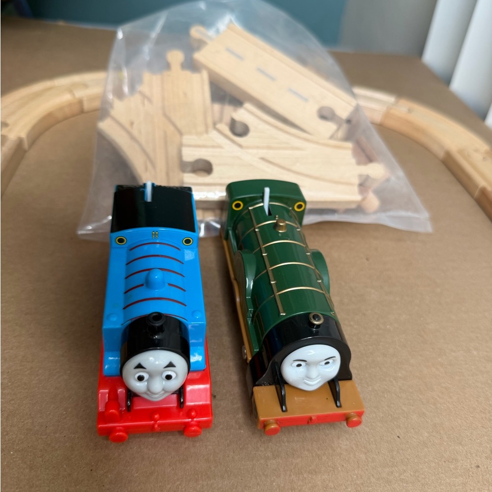 Thomas & Friends - Thomas Engine and Emily engines on compatible wooden tracks.